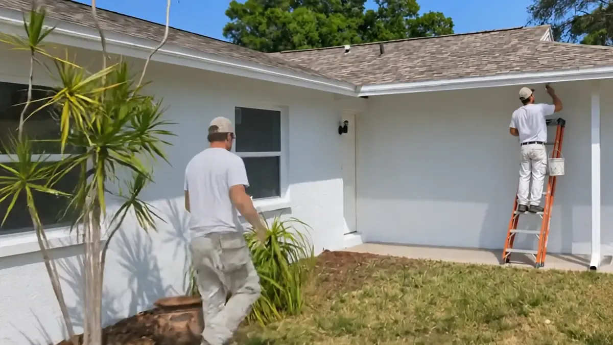 A repainted single story home in Lakeland with white trim and a clean driveway